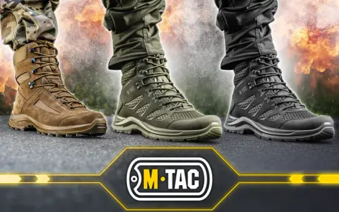 Trzy pary solidnych, dobre buty taktyczne M-Tac w kolorach: brązowym, oliwkowym i czarnym, na tle płomieni.